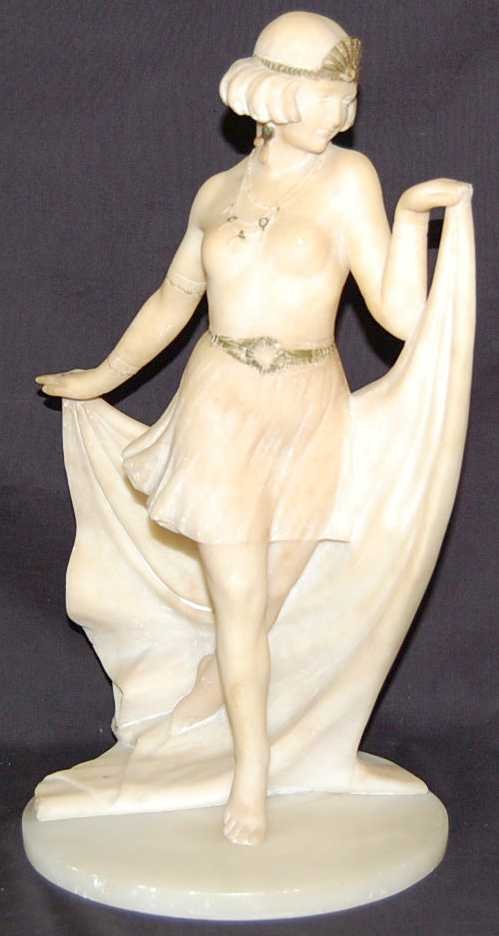 ART DECO MARBLE FIGURE OF SEMI NUDE DANCER: HIGHLY DETAILED ART DECO SEMI NUDE DANCER, WITH EARRINGS, FEATHER IN HER HAIR, BRACELETS, AND RINGS, 9"W, 7"D, 15"TALL CA 1920