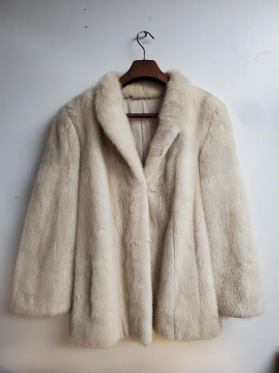 Rich White Mink Fur Jacket: Super thick and soft White Mink Ladies Jacket. No Size but seems fit Small/Medium Shoulder to Shoulder 17 in. Bottom of Back Neck Seam to Bottom Back 27 in.L Sleeve Length 23.5 L 2 Outer pockets One i