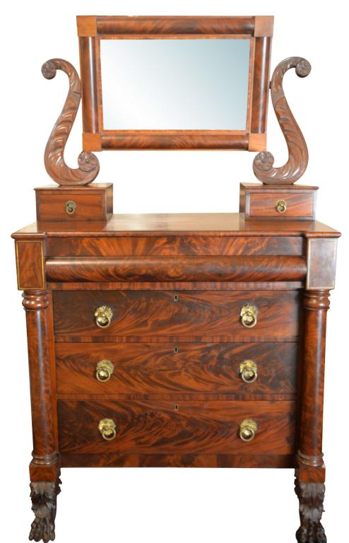 Fine Antique American Empire Mahogany Dresser: Superb example of period American Empire antique Gentleman's dresser! Spectacular flaming mahogany dresser topped with acanthus lyre mount swivel mirror and 2 accessory drawers. Case is topped with ro
