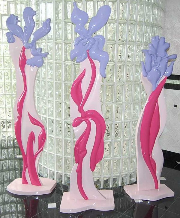 The Flower Garden sculptures by Jane Goco: Set of three hand carved Iris flowers, original cost $9,000 USD, 20"W, 15"D. 74"TALL
