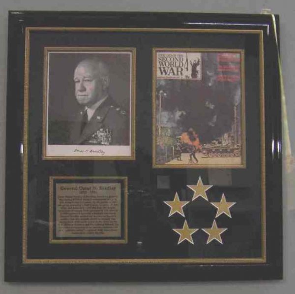 General Omar Bradley Signed Picture in Display: WWII General commanded the largest field of men in U.S. history. Measures 25 inches by 25 inches.