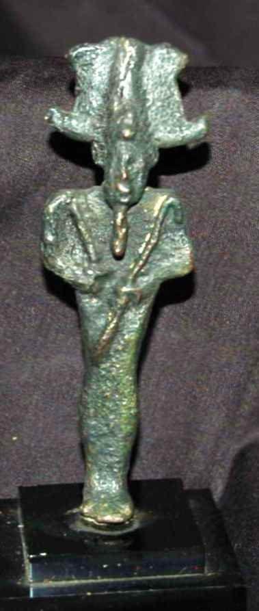 Bronze Statuette of Osiris Egyptian: Egyptian Lord of the Afterlife CA 600-400 B.C. Portrayed in mummy form, bearded with elaborate "Atel" crow and hold Flail and Crook. Good Fine Detail. CoA Coin Craft - London 1"W 4"H