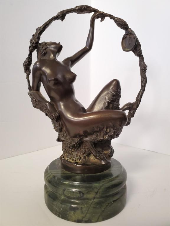 Georges Omerth "Nude Satyr on May Vine" Bronze: Bronze art nouveau sculpture of a nude satyr reclining on May vine covered trellis mounted on a green round marble base. Absolutely gorgeous Art Nouveau artwork. Medium: Bronze. Condition: Very good. 