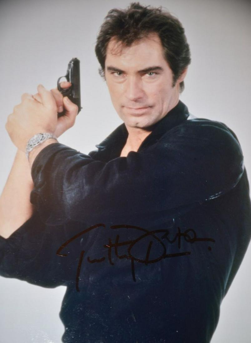 James Bond, Timothy Dalton, Signed Photo COA: James Bond. 8x10 color glossy photograph of Timothy Dalton as James Bond signed by him in felt tip ink. Dalton, thought by many as the best Bond of them all, starred twice as 007 in The Living Dayligh
