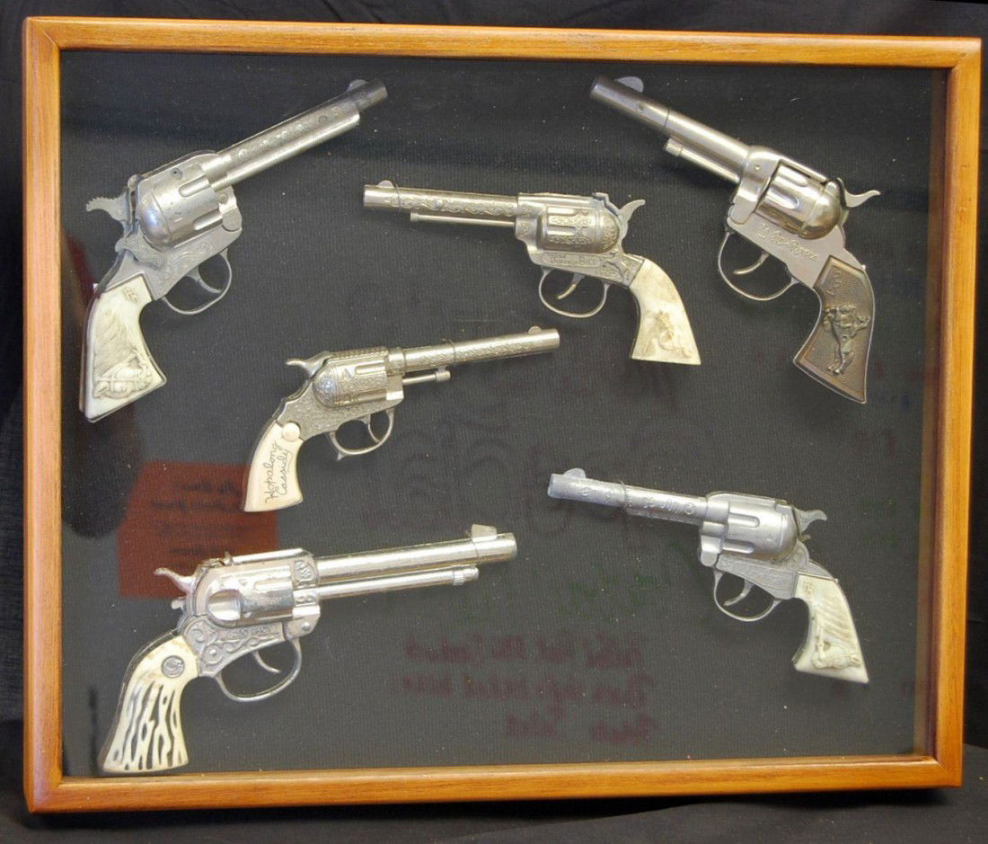 COLLECTION OF WESTERN TOY CAPGUNS: CUSTOME BUILT SHADOWBOX FRAME