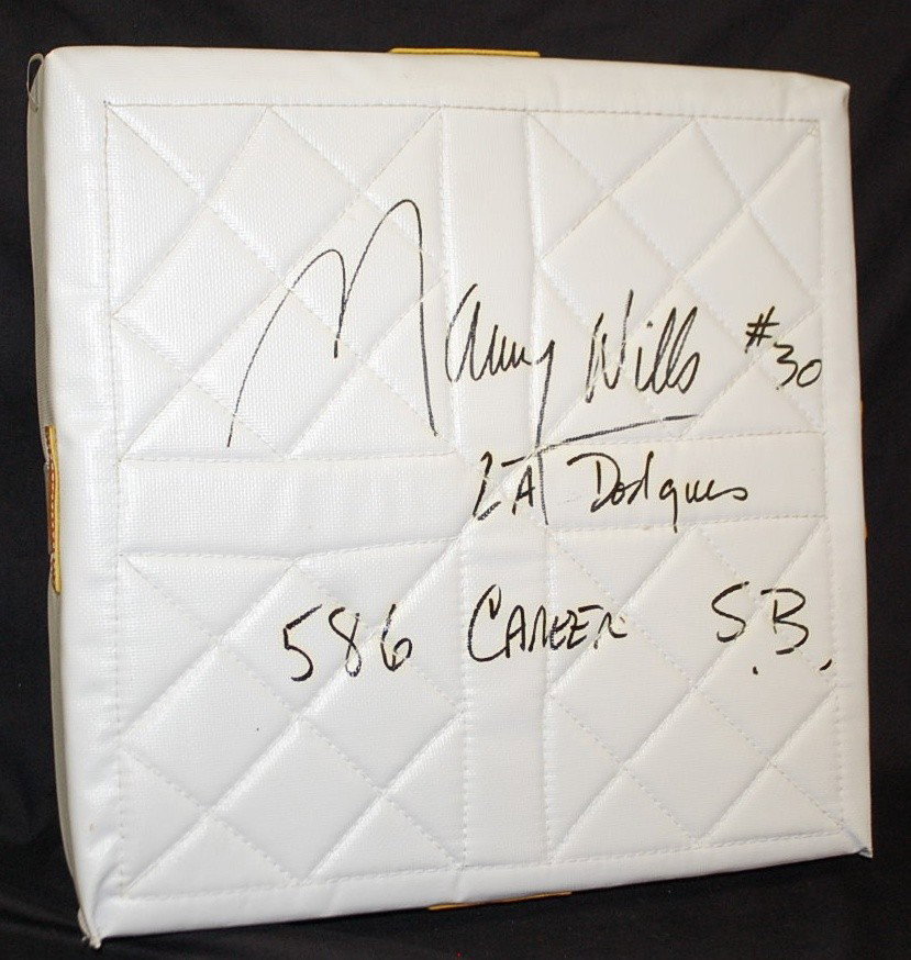 MAURY WILLS AUTOGRAPHED BASE PAD: LA DODGERS #30 WITH 586 CAREER STOLEN BASES