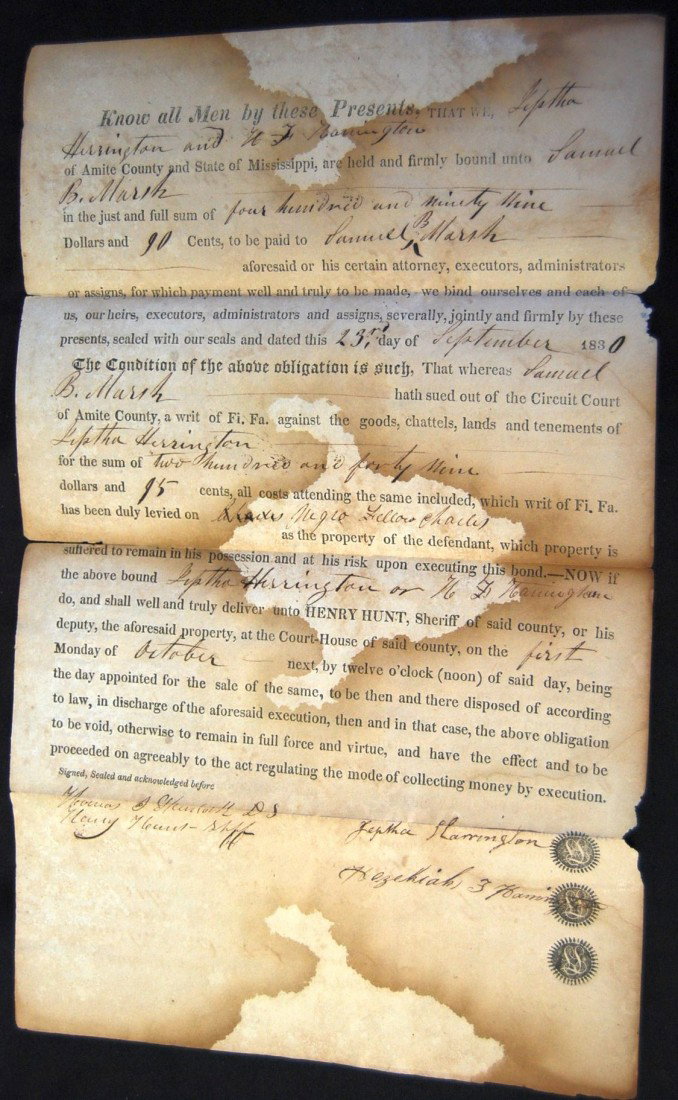 1830 MISSISSIPPI FI. FA. AND FORFIET AGAINST SLAVE: BONDED 23rd SEPTEMBER 1830 & FORFIETED ON OCTOBER 1, 1830. 249.95 LEVY ON 'NEGRO FELLOW CHARLES'. INCLUDES THREE COURT SEALS. FROM FAMILY ATTIC CACHE OF DOCUMENTS FROM ANTEBELLUM MISSISSIPPI COURTHOUS