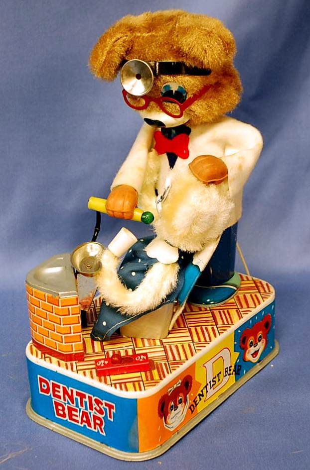 BATTERY OPERATED DENTIST BEAR IN BOX: WITH DRILLING HAND AND CRYING BABY BEAR WITH ORIGINAL BOX