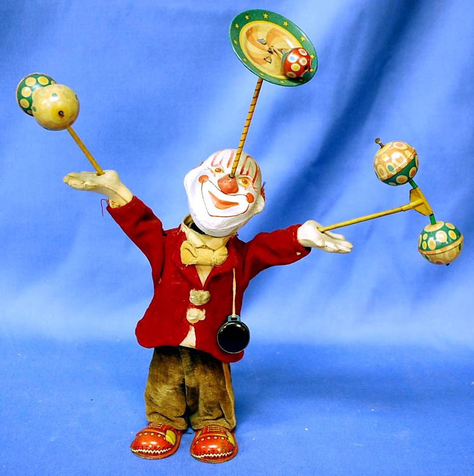 WINDUP CLOWN WITH SPINNING PLATE & BALLS: WINDUP