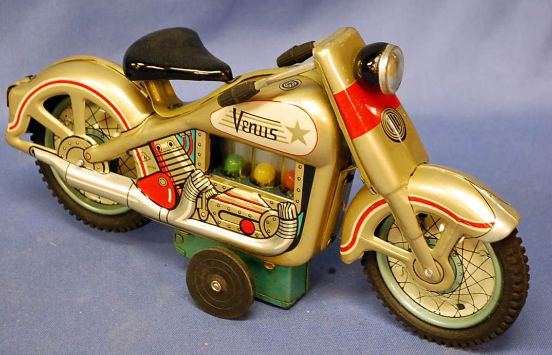 T N JAPAN FRICTION VENUS MOTORCYCLE: WITH POP UP BALLS IN CYLINDERS