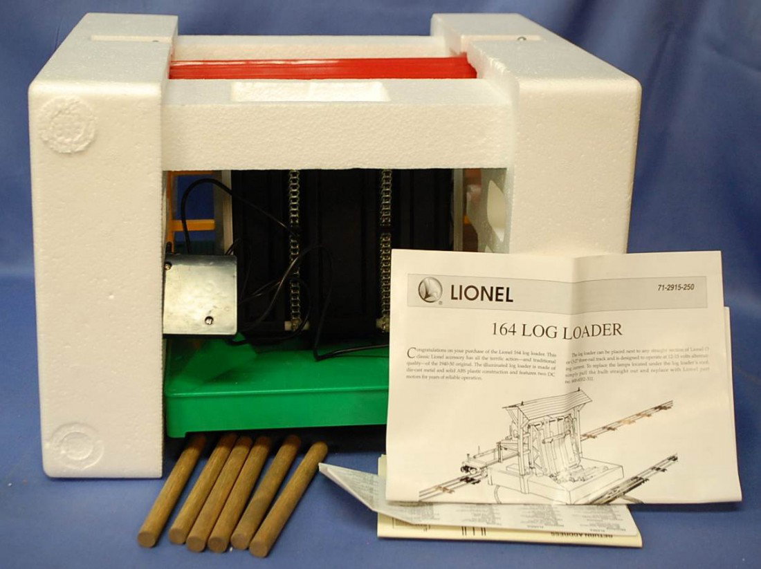 LIONEL LOG LOADER #164 STILL IN BOX: HAS LOGS AND INSTRUCTIONS, ORIGINAL BOX