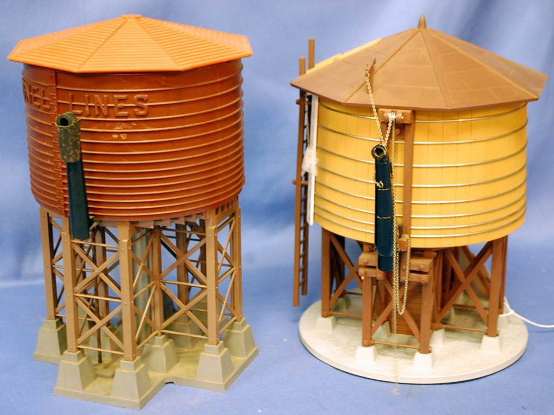 TWO LIONEL LINES WATER TOWERS: ONE WITH MEASURE ON SIDE