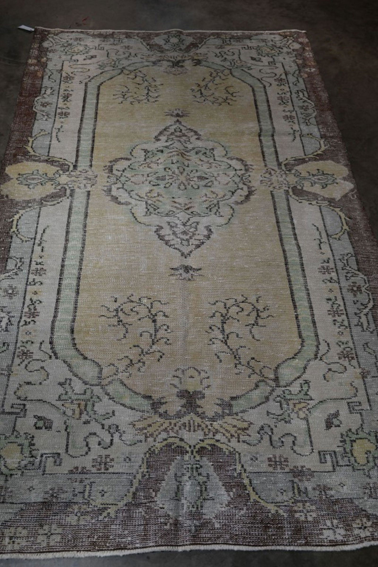 Oushak Hand Knotted Rug 5.1 x 8.7 ft: Fine Hand knotted Rug. Size: 5.1 x 8.7 ft. Retail $1000. Ready to use. Most of our rugs are semi-antique, 25-75 years old so expect some wear. Please be sure and view all pics for condition.