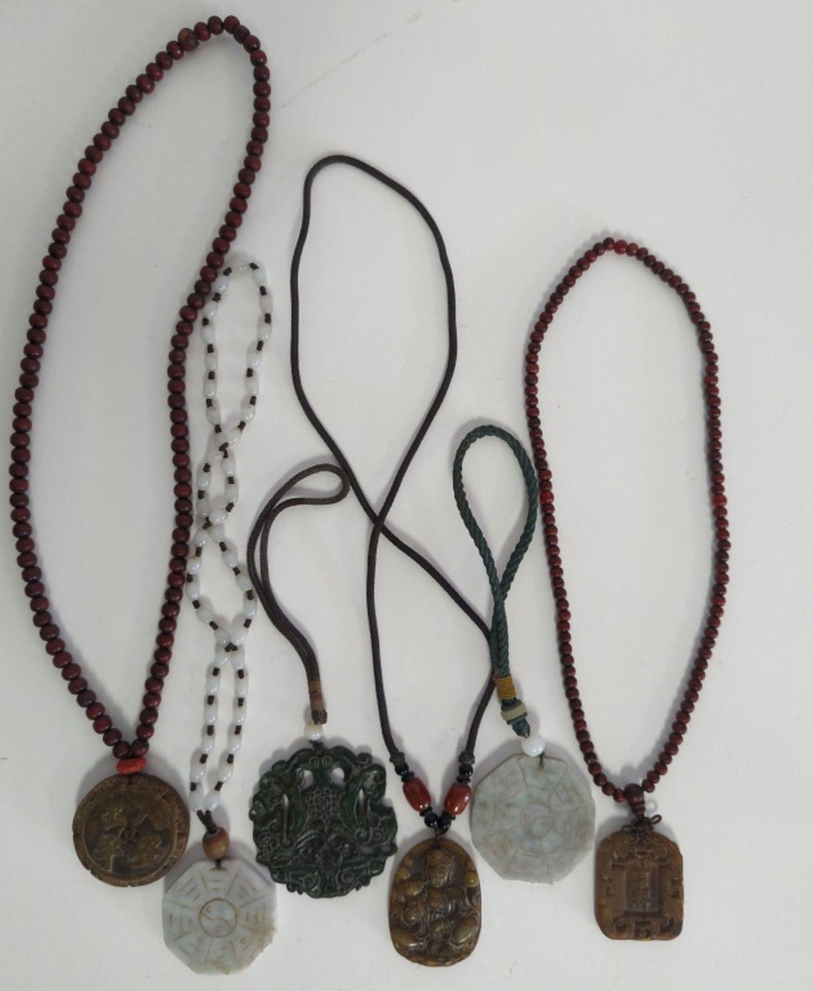 6- Antique Chinese Necklaces, Carved Pendants: 6- fantastic Antique Chinese Necklaces with beautifully carved stone pendants. All 6 for one money! Late 19th/early 20th century. All in very good condition. Be sure and view all pics for condition. C