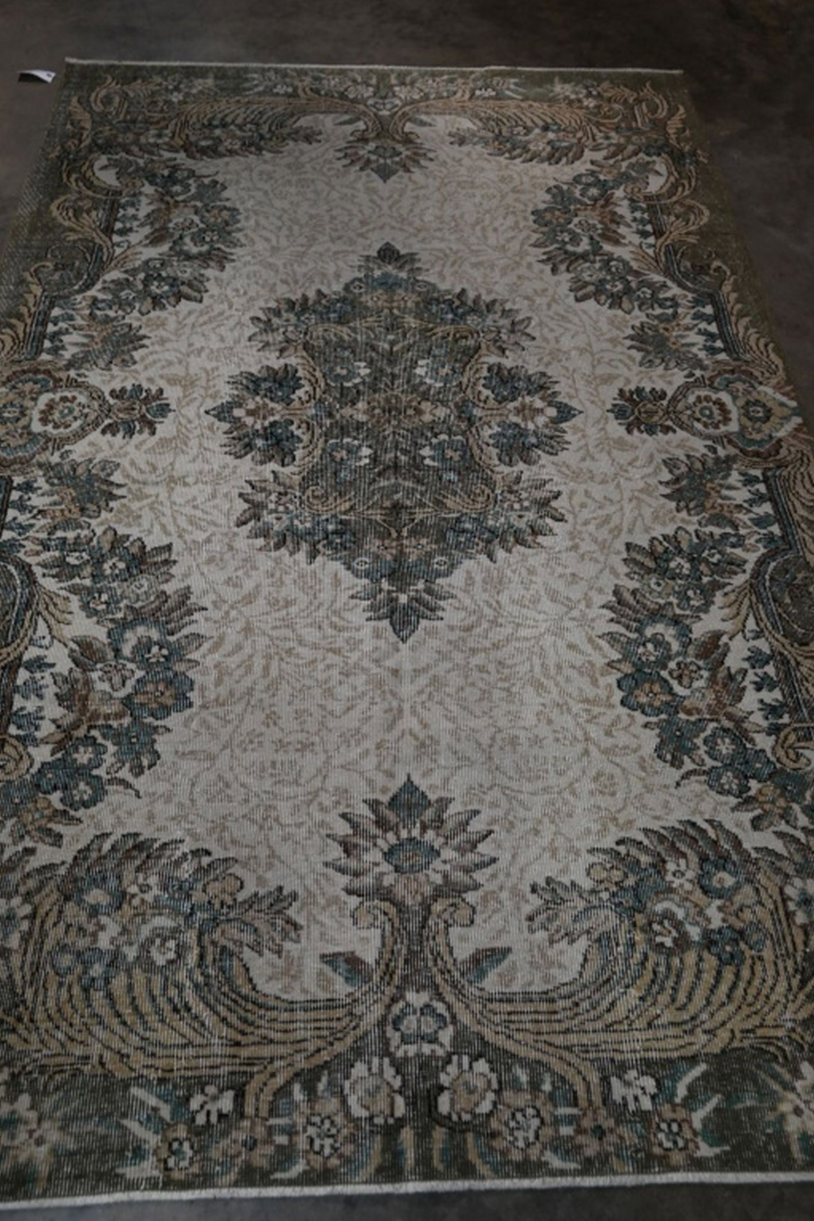 Oushak Hand Knotted Rug 5.6 x 8.10 ft: Fine Hand knotted Rug. Size: 5.6 x 8.10 ft. Retail $1000. Ready to use. Most of our rugs are semi-antique, 25-75 years old so expect some wear. Please be sure and view all pics for condition.