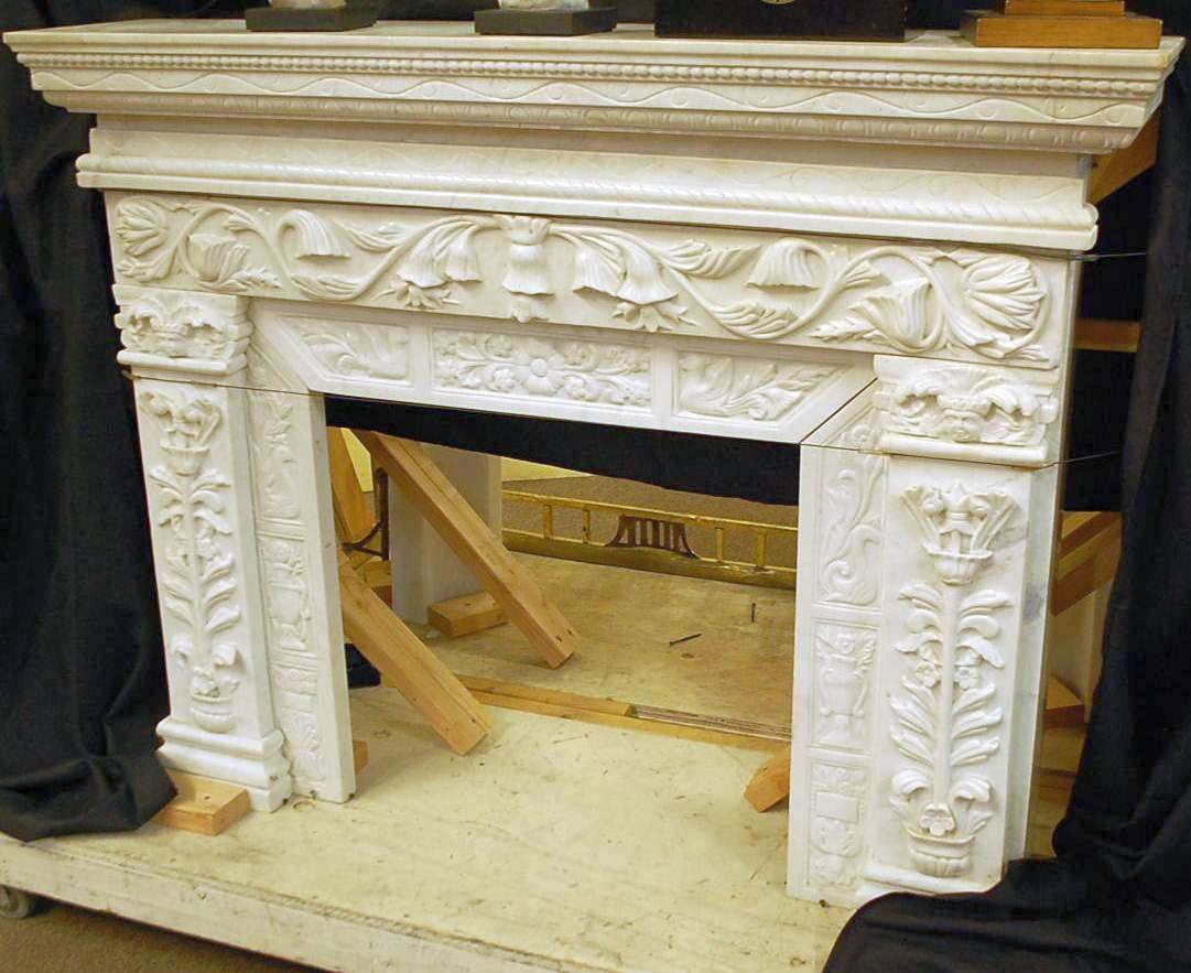 016: HAND CARVED SOLID MARBLE MANTLE: FIGURAL AND FLORAL CARVING FROM WINDEMERE HOME, COMES IN SEVERAL PIECES FO EASY MOVING