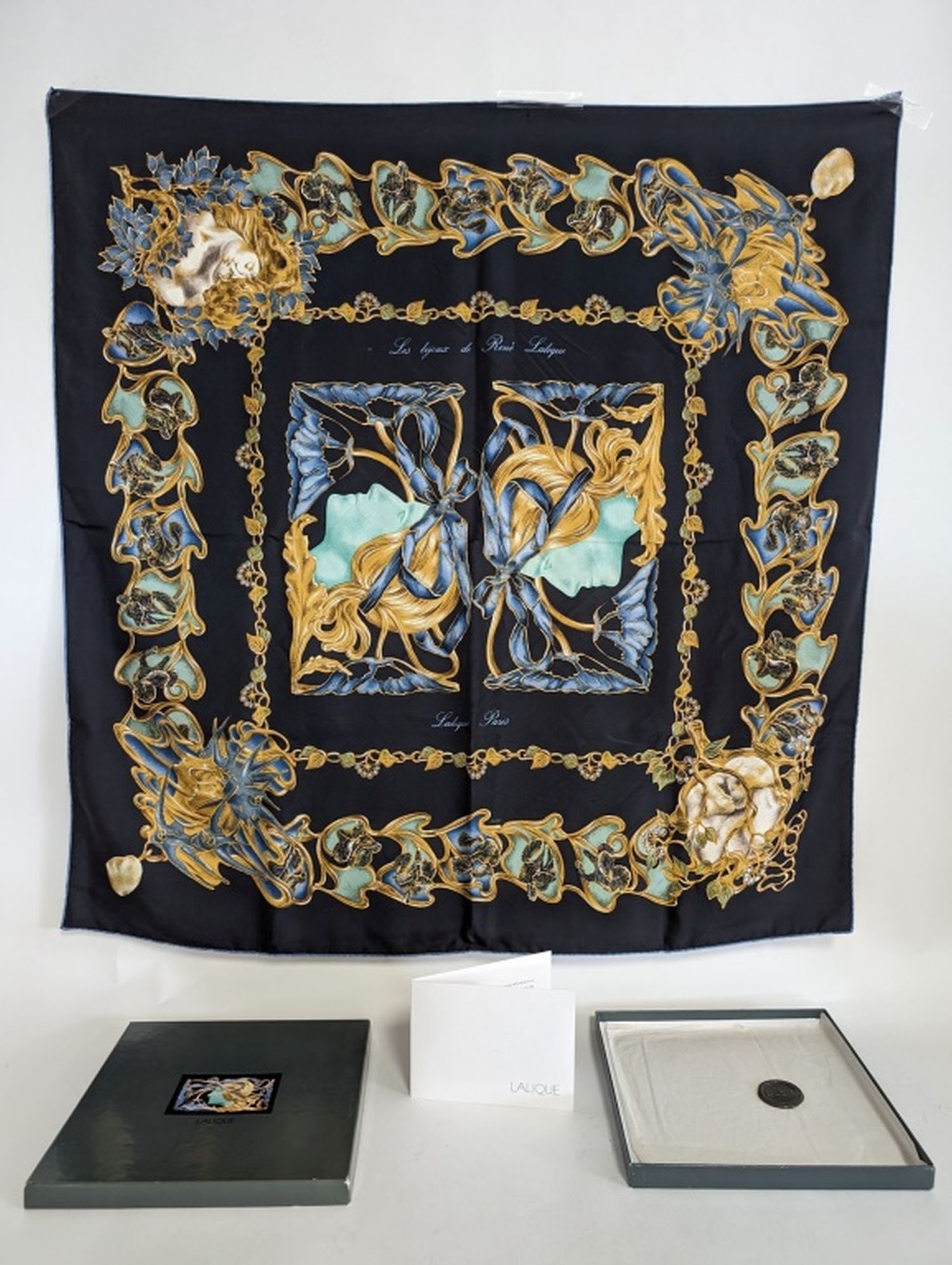 Lalique Paris Silk Floral Kerchief Scarf: This fine scarf by Lalique Paris is unused with its original box. Absolutely beautiful art nouveau fashion. 33.5 x 34.5 in. Excellent condition. Expect to pay $500 and up online right now.