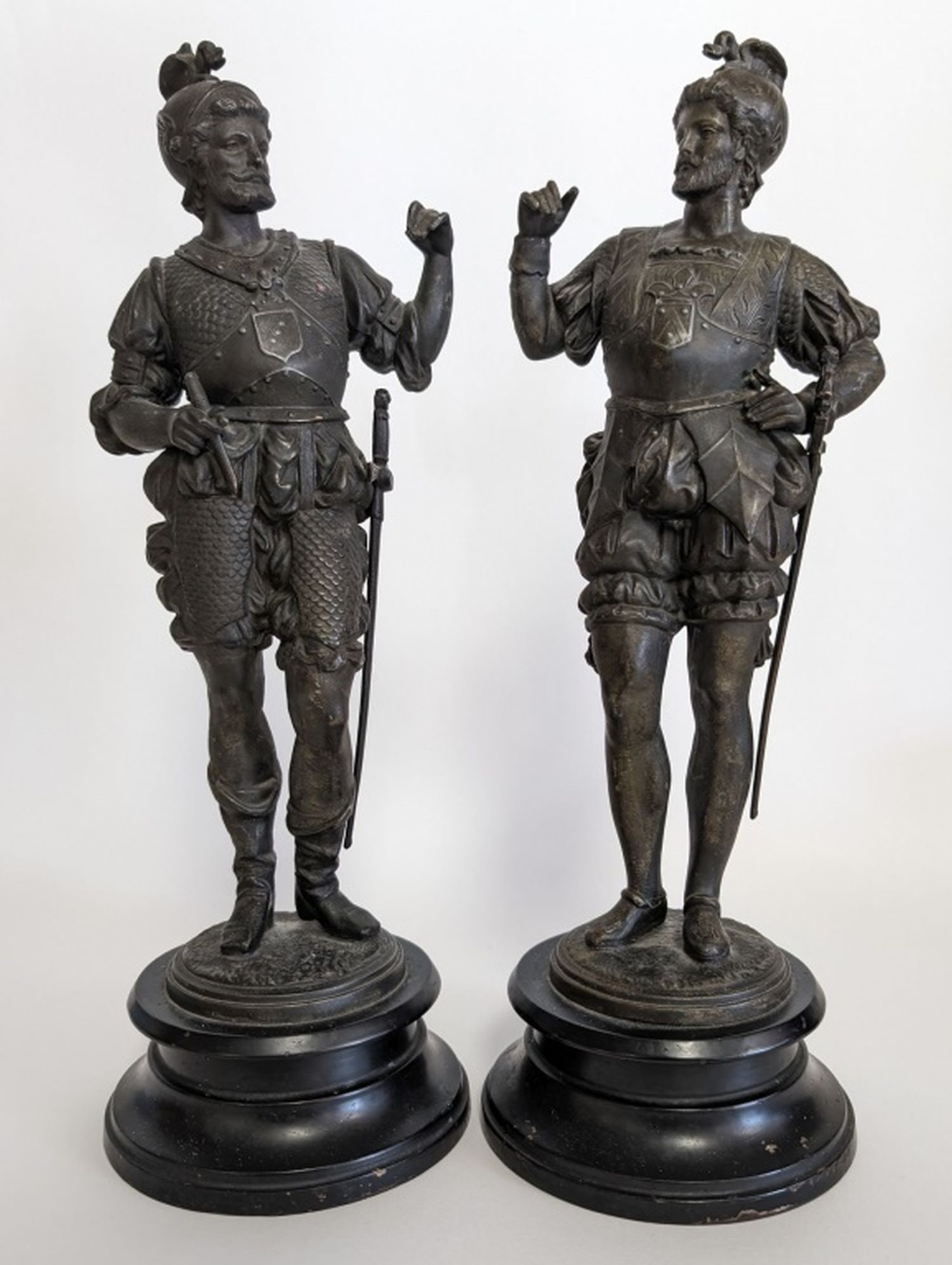 Pair of Antique Cast Metal Conquistadores: Statement making and highly detailed pair of Spanish Conquistadores. Circa 1920. Beautiful and strong looking at the same time. Very good overall condition with minor wear. 14.75H x 5.5W x 5.5D in. Fr