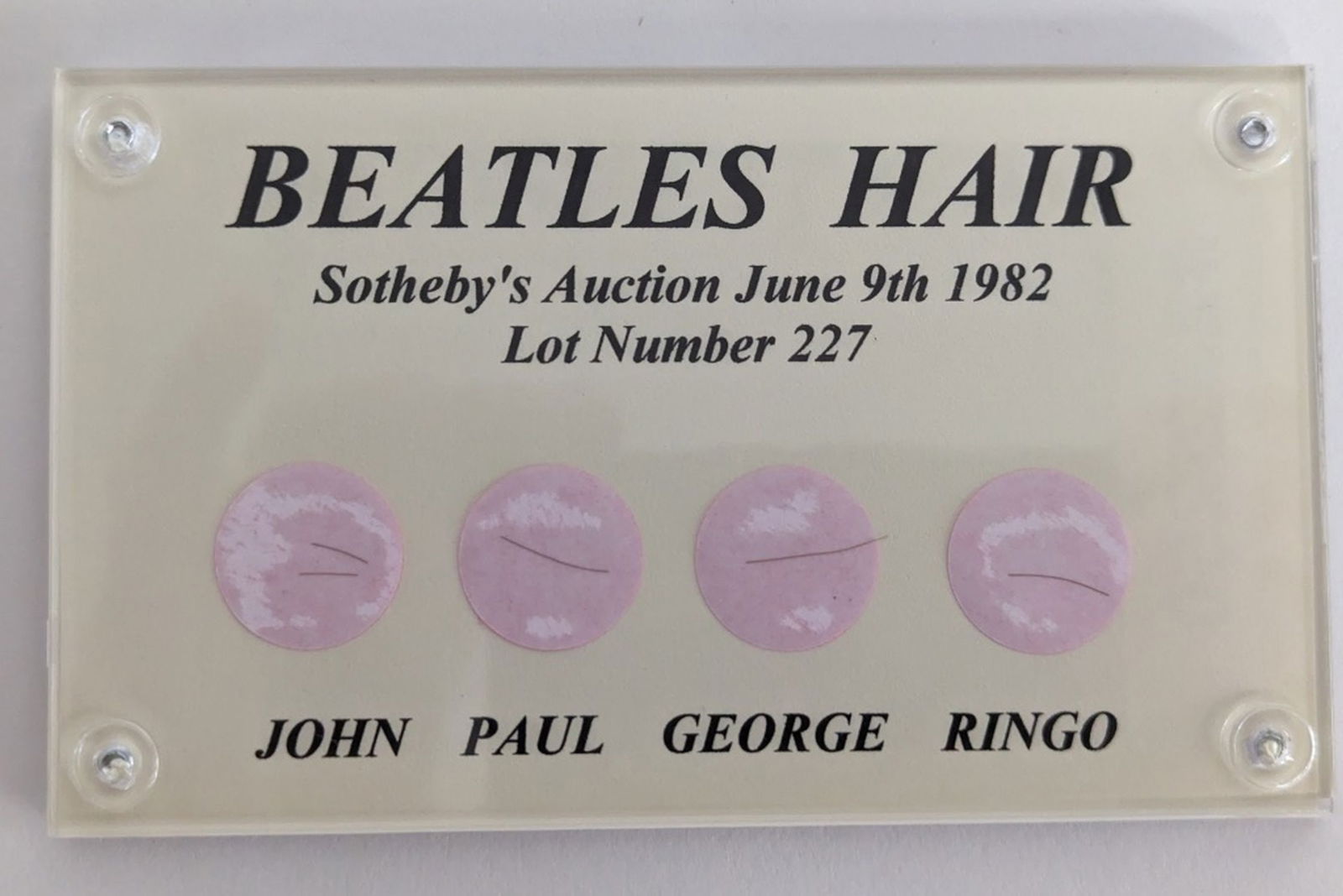 All 4 Beatles Hair Strand Collection, COA: This Limited edition Beatles Collection display containing a single half-inch strand of hair from John Lennon, George Harrison, Paul McCartney, and Ringo Starr, is numbered 232 of 250. The hair was or