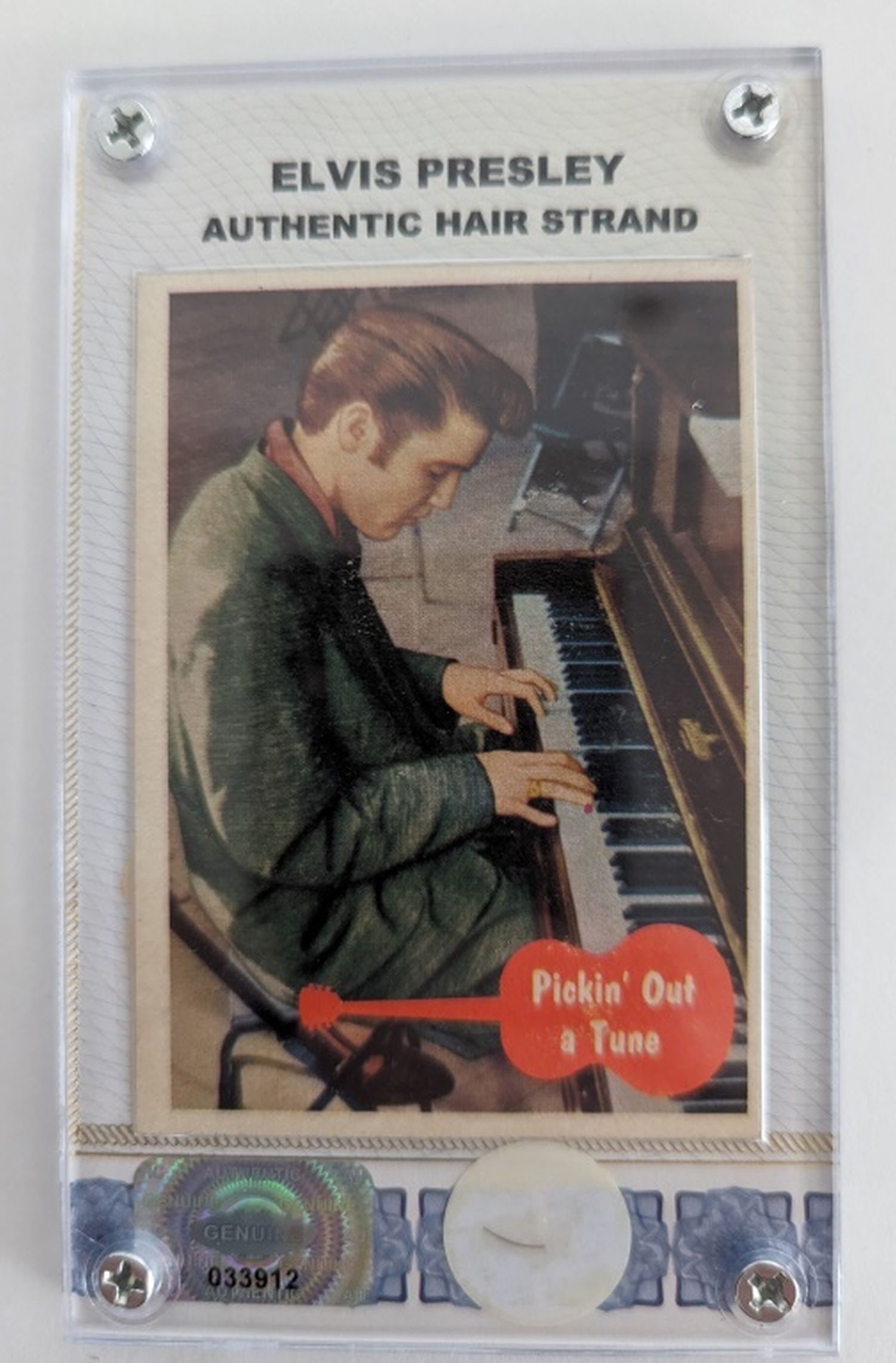 Elvis Presley Hair Strand COA #12: Elvis Presley Hair Strand! From the estate of Fred Stoll who was a security guard and gate keeper at Graceland starting in 1962. This number 12 from a limited edition of only 46! This strand comes in