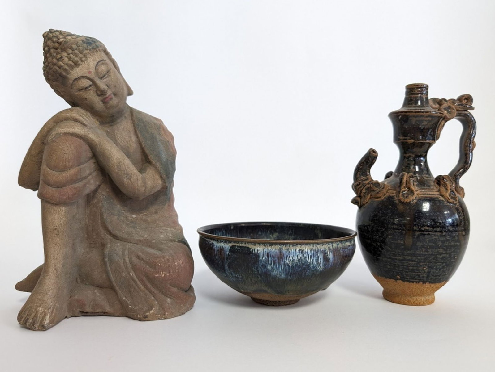 China Bhudda, Wine Pot, and Bowl: Fantastic lot of 3 antique/vintage Chinese items including a wood Buddha 8.25H x 5.5W x 5.25D in., Wine Pot 8.25H in., and Bowl 2.25H x 5.25W in. Very good condition with minor wear. From a fine Chine