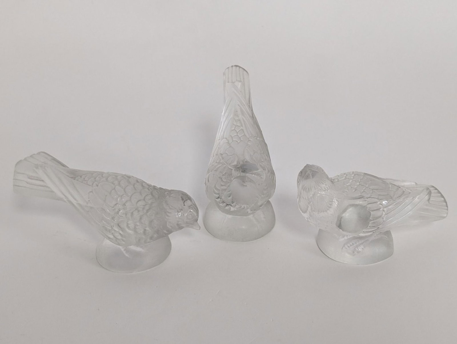 3- Lalique Frosted Crystal Birds: 3- Beautiful art glass birds from Lalique. They range from 4 - 5 inches long. Very fine decor. All 3 for one money! Very good condition. No visible chips or cracks. Please be sure to view all photos f