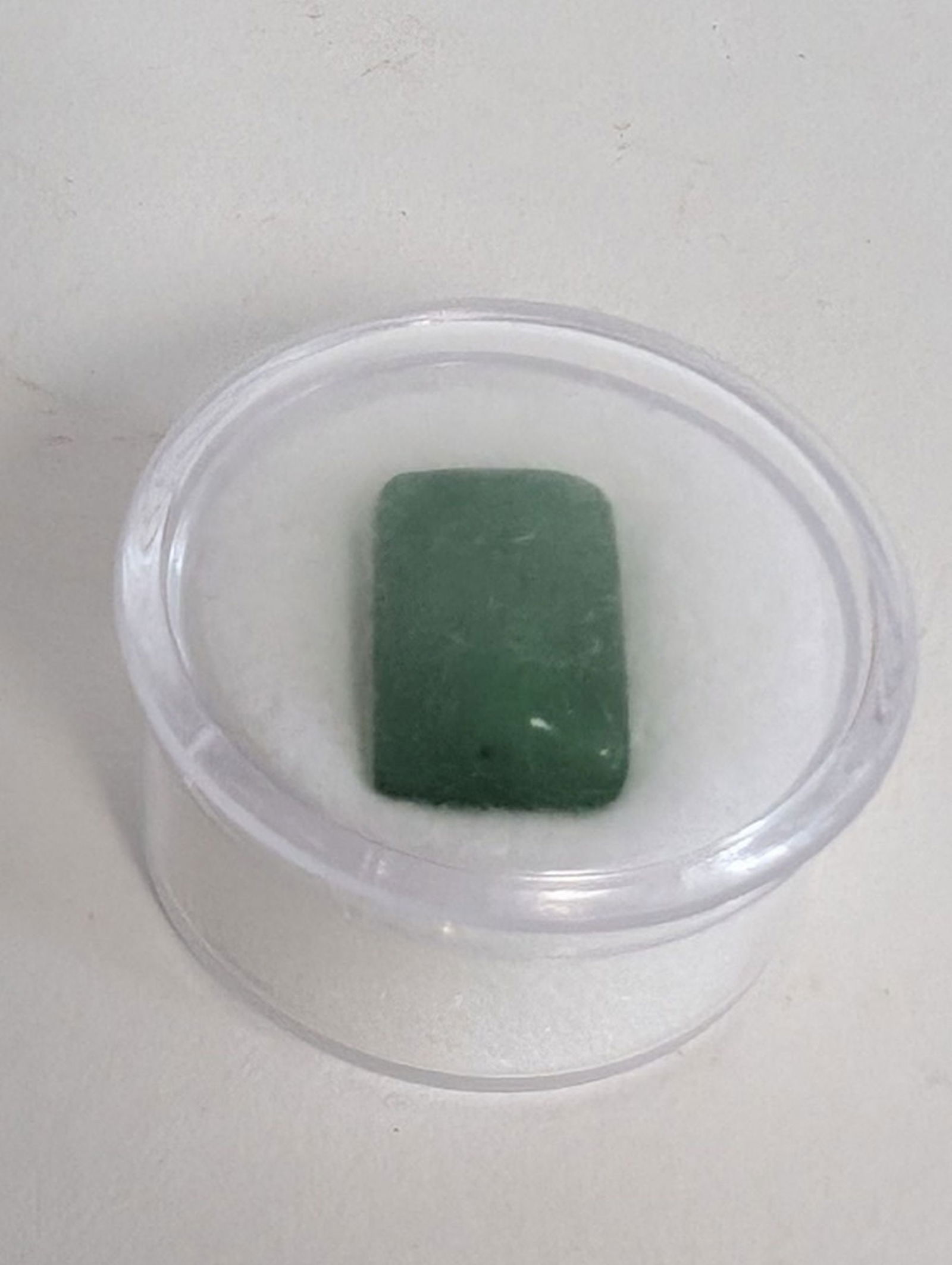Genuine Rectangular 10.75ct Brazilian Emerald: Superb quality 10.75 carat rectangular Brazilian Emerald Cabochon loose gem. Huge stone in excellent condition! Be sure to view all pics for condition. Provenance: From a Chinese owned private estate