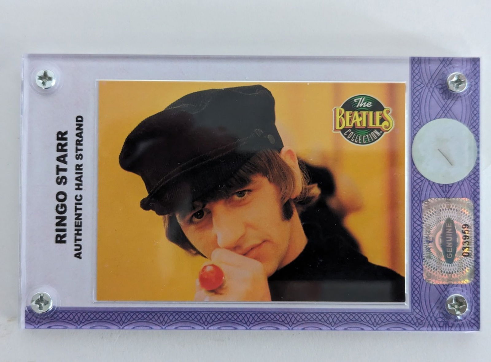 Beatles' Ringo Starr Hair Strand, COA: This Limited edition Beatles Collection display consists of an individual single half-inch strand of hair from Ringo Starr, numbered 59. The strands of hair were taken from the lot that was originally