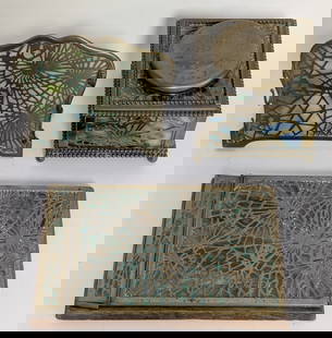 Tiffany Studios Pine Needle Desk Set: Fine desk set signed Tiffany Studios in the Pine Needle pattern. Inkwell with glass insert 3.5H x 4.5W x 4.5D in., Note Pad 5 x 7.75 in., Pen Rack 4.25H x 5.25W x 2.25D in. Very good antique