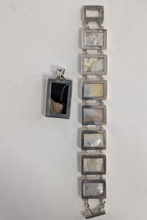 Marta Sterling Mother o Pearl Bracelet Set: Fine designer jewelry by Marta. Sterling Silver and Mother 'o Pearl bracelet and pendant! Very good condition. Both pieces for one money! Congratulations to the winning bidder!