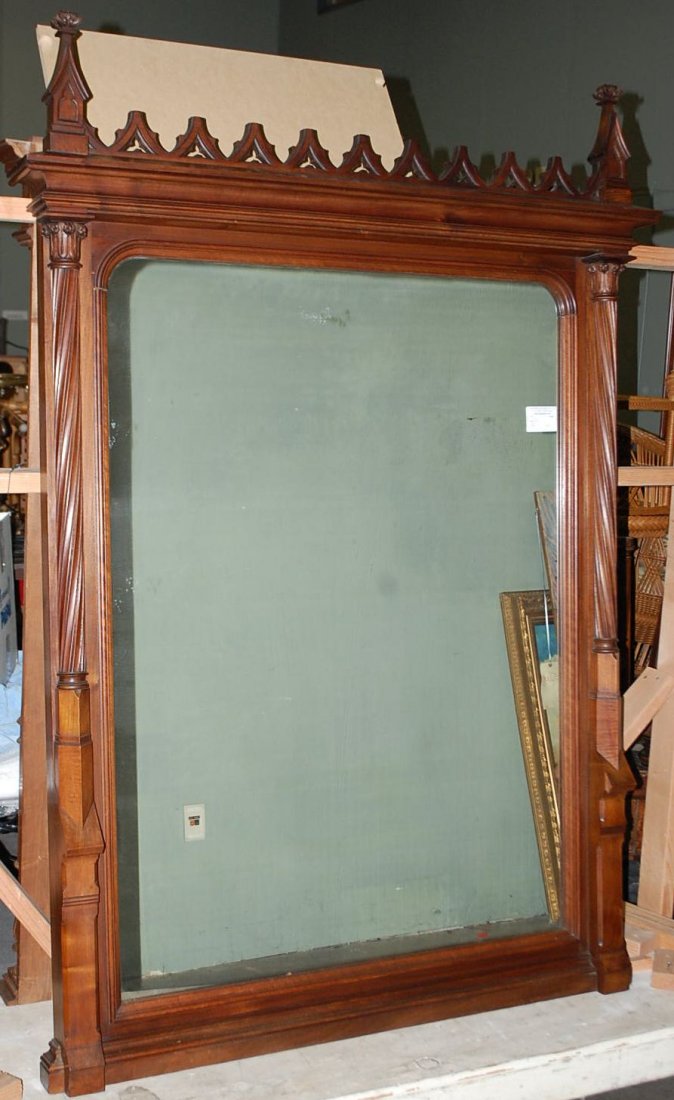 RARE GOTHIC OAK MIRROR CA 1880: CARVED COLUMNS, PIERCED CARVED TOP CA 1880 FROM HISTORIC POTTER HOUSE. MEASUREMENTS ARE APPROXIMATE: 74" HIGH WITH CARVINGS IN TOP, 64" HIGH WITHOUT CARVINGS ON TOP, 52" WIDE