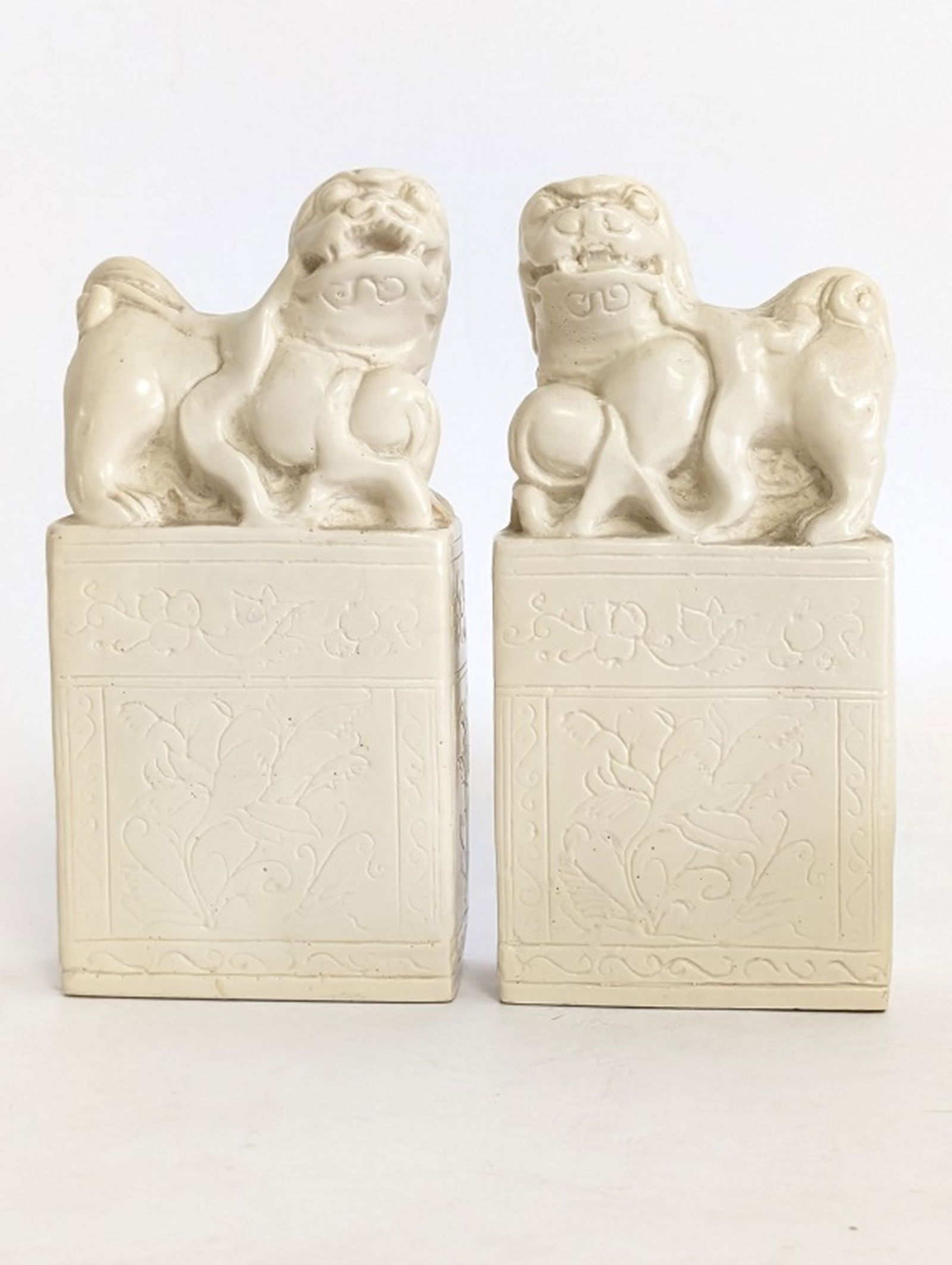 Pr Large Antique Chinese Lion Seals 7"H: Beautiful pair of antique Chinese white glaze lion seals! Both in very good antique condition. 7H x 3.25W x 2D in. Please be sure to view all photos for condition. From a decades long Chinese collecto
