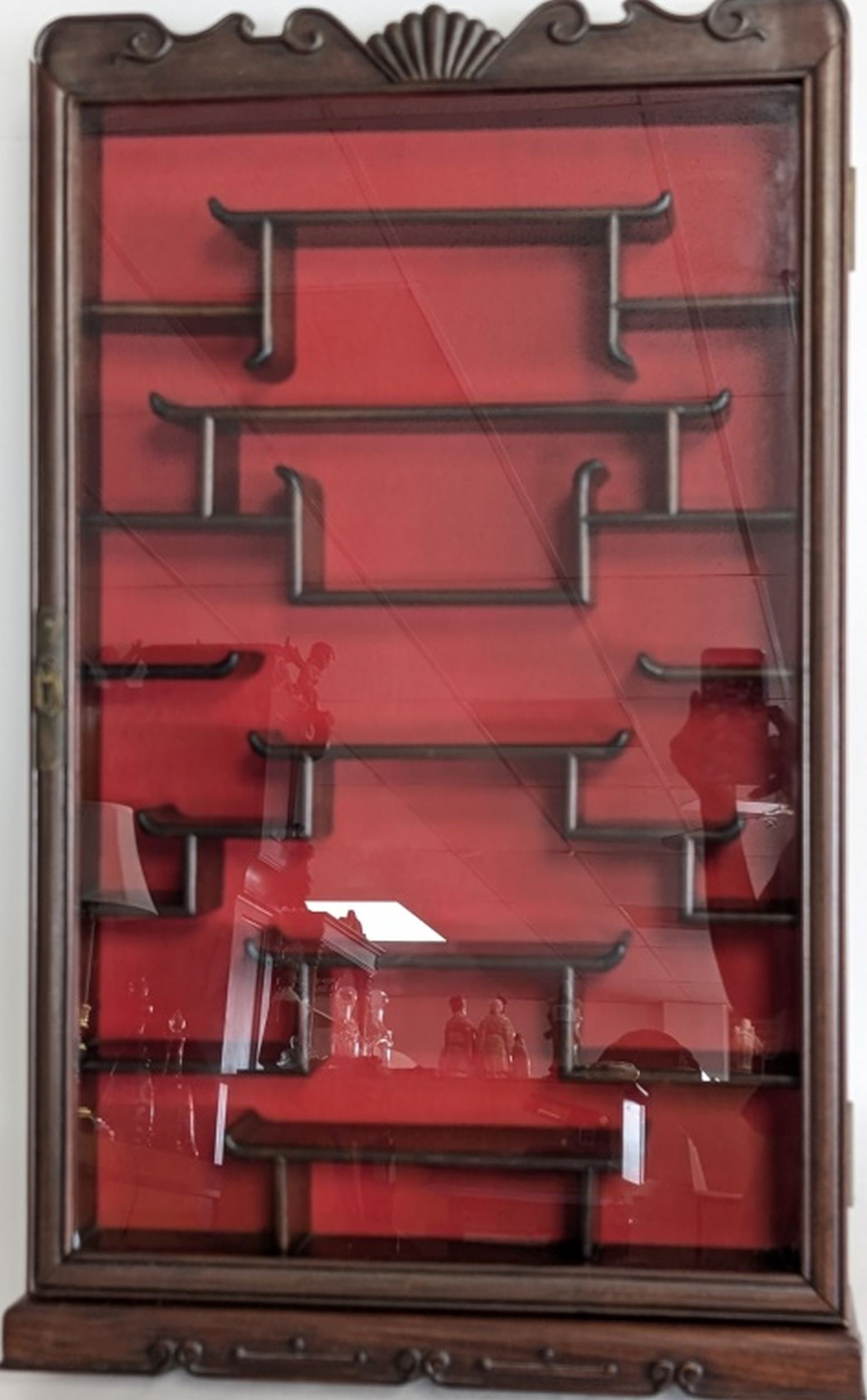 Vintage Asian Rosewood Curio Cabinet 35H": Beautiful, solid rosewood, display cabinet from the mid century. Fine design and craftsmanship. Ready to hang or set on a surface. 35H x 13.75W x 1.5D in. Good condition with minor wear. Mild joint se