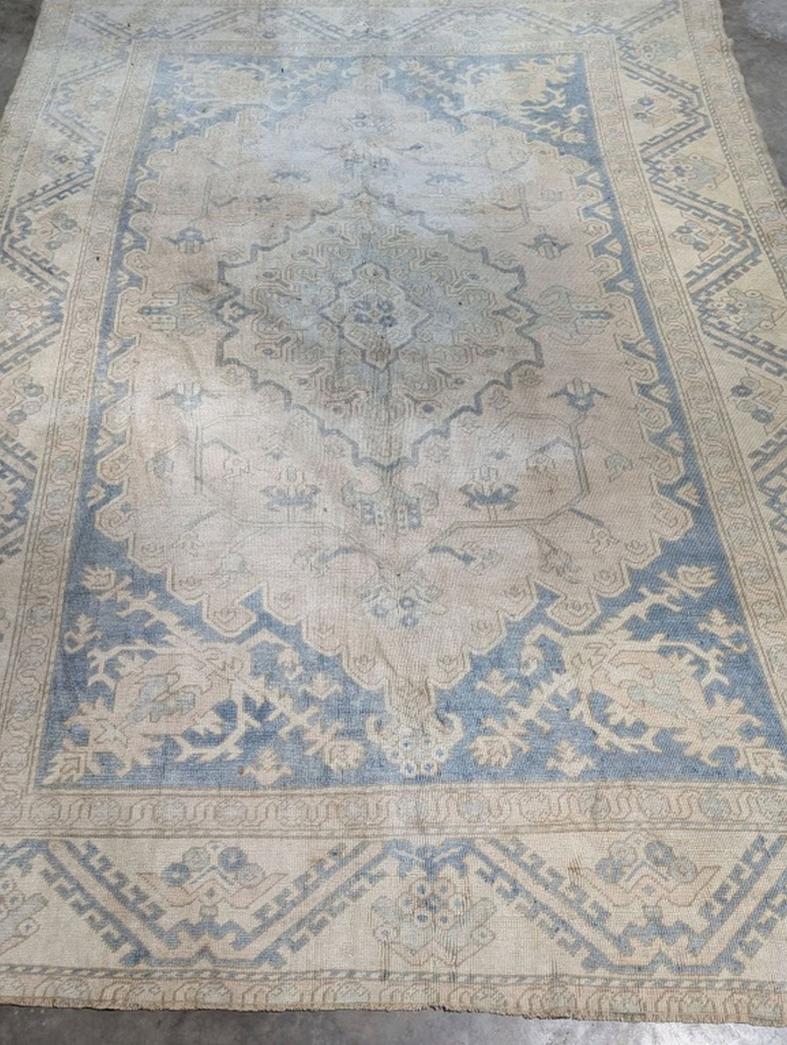 Oushak Hand Knotted Rug 6.10 x 9.6 ft: Beautiful Hand Knotted Rug! 6.10 x 9.6 ft. Retail 1600. Semi-antique 20 - 50 years old. In good condition and ready to use. May have some wear. We consider the photos to be the condition report. Pleas