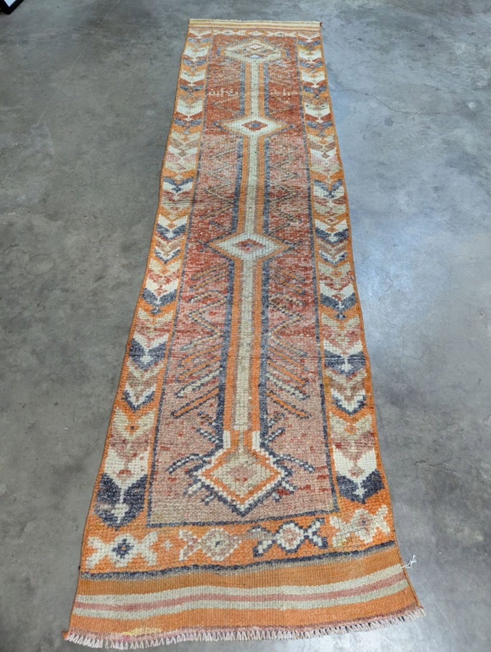 Oushak Hand Knotted Runner Rug 2.9 x 10.9 ft: Beautiful Hand Knotted Rug! 2.9 x 10.9 ft. Retail 1500. Semi-antique 20 - 50 years old. In good condition and ready to use. May have some wear. We consider the photos to be the condition report. Pleas