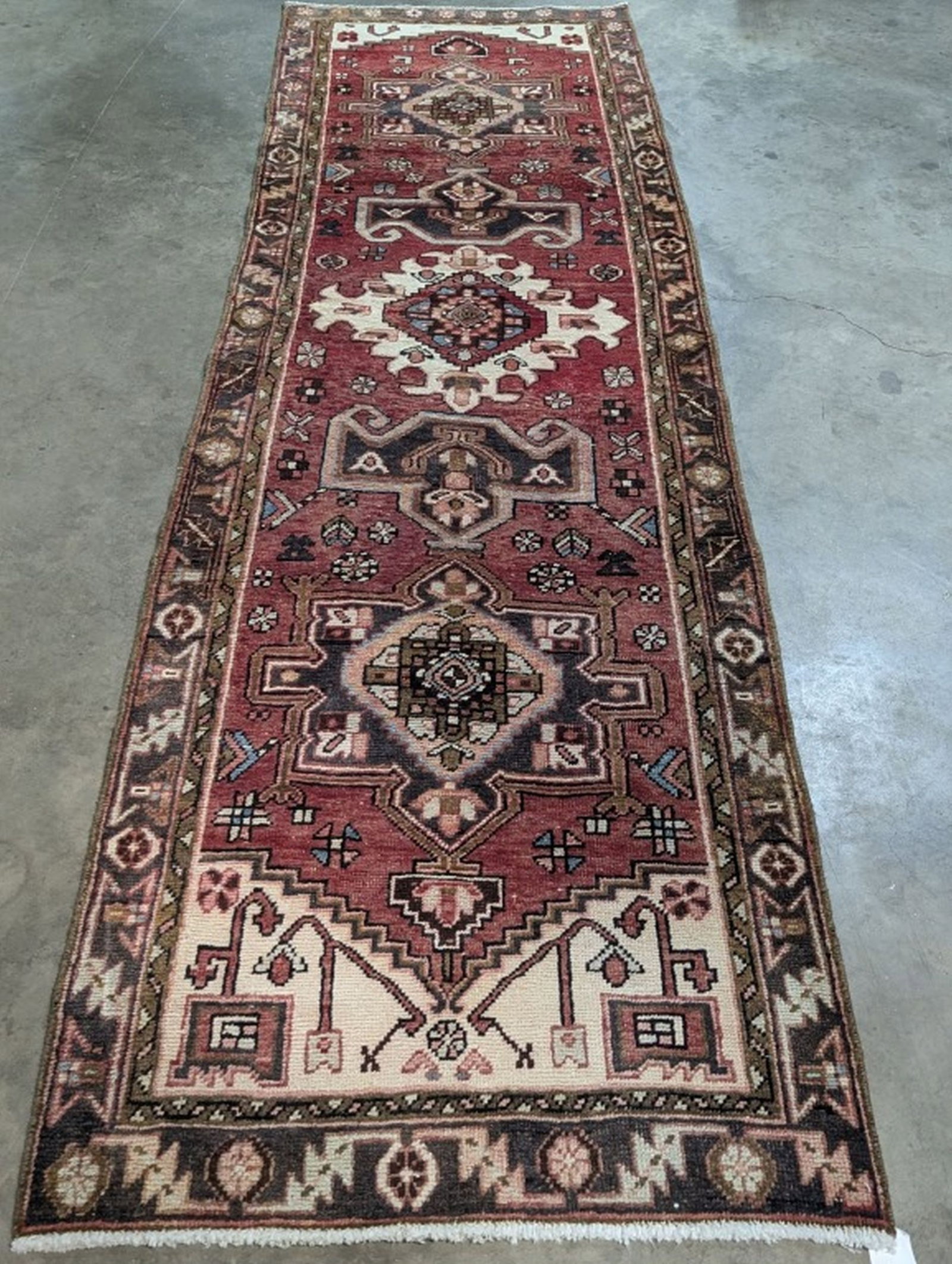 Karajeh Hand Woven Runner Rug 3.2 x 10.5 ft: Beautiful Hand Knotted Rug! 3.2 x 10.5 ft. Retail 1500. Semi-antique 20 - 50 years old. In good condition and ready to use. May have some wear. We consider the photos to be the condition report. Pleas