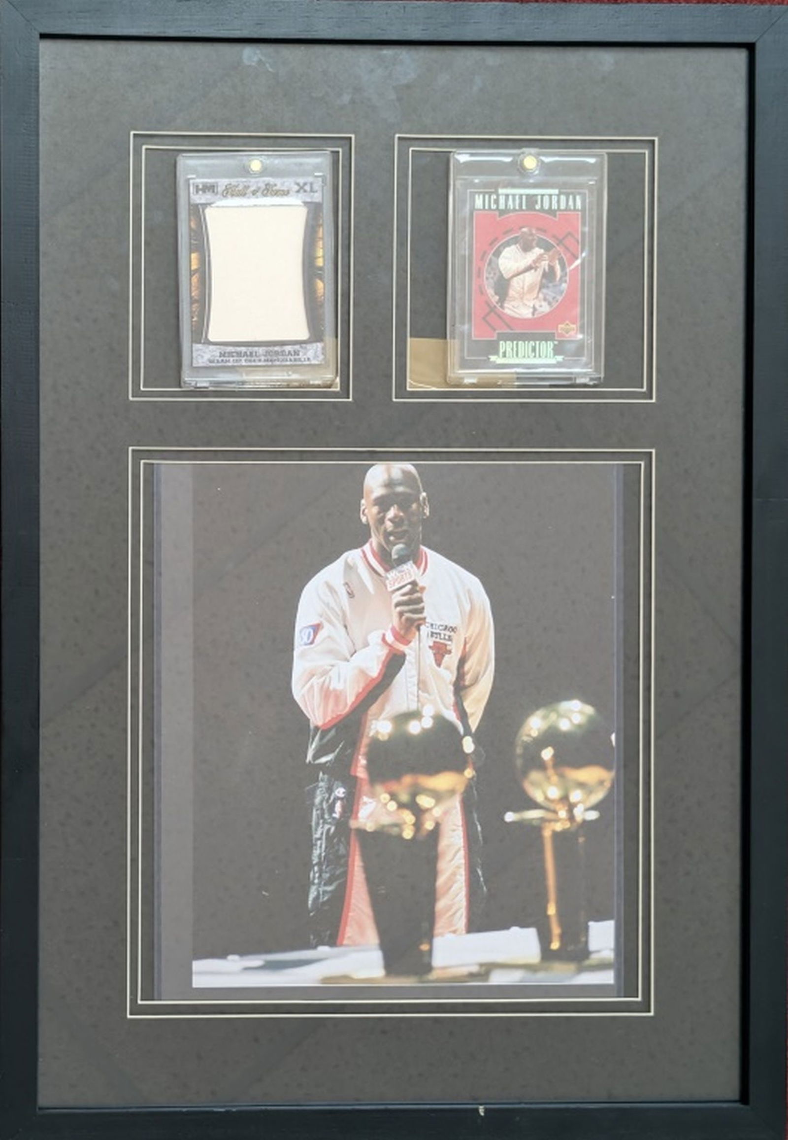 Michael Jordan, Photo, Card, & Jersey Collage: Amazing custom-framed piece commemorating Michael Jordans illustrious career. Left Card: Michael Jordan "Hall of Fame XL trading card, likely from a limited edition set, with a jersey swatch. Right Ca