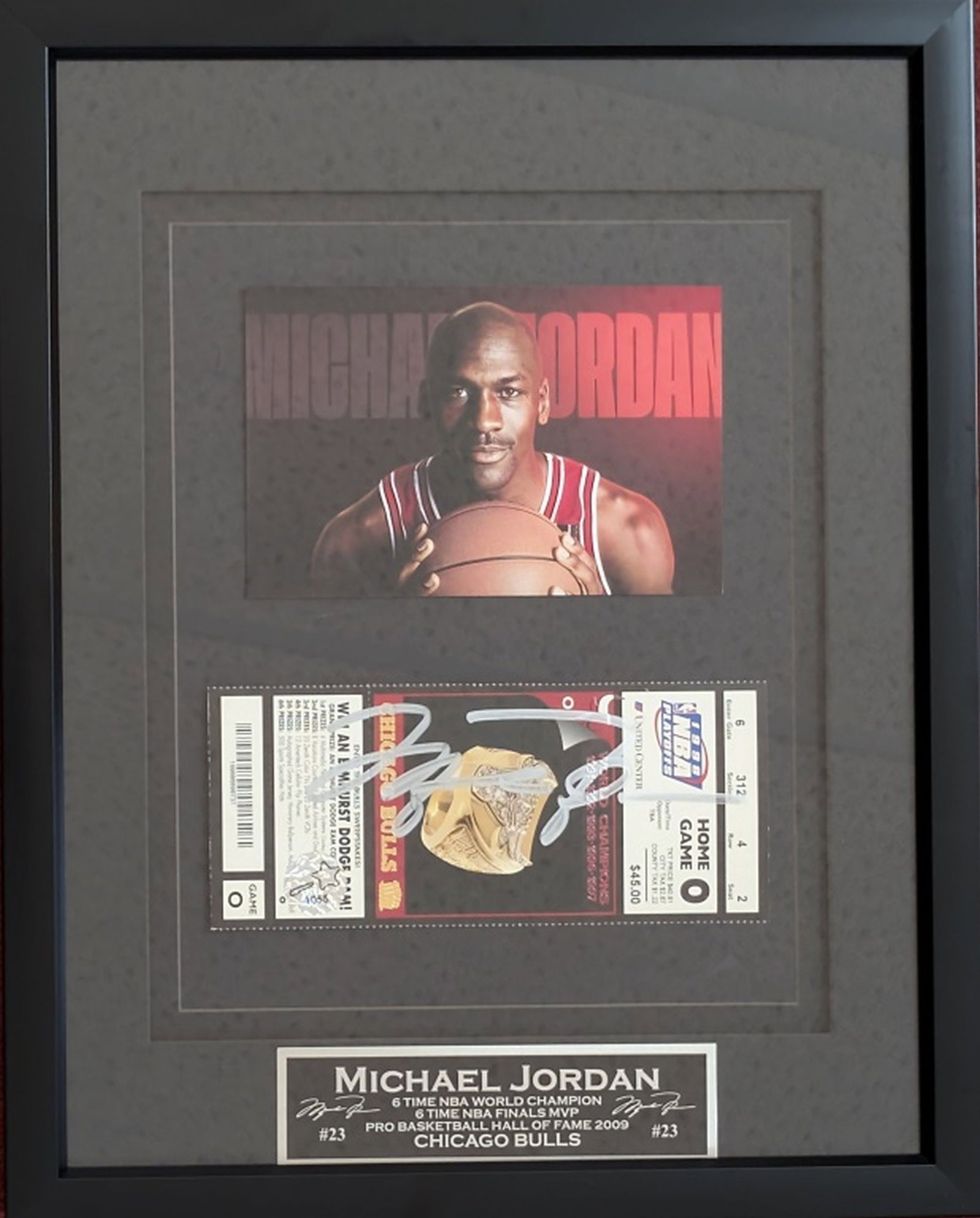 Michael Jordan Photo & Hand Signed Playoff Ticket: Highly desirable Michael Jordan display that comes with a consignor provided COA from the Make A Wish Foundation. Make-A-Wish Certificate of Authenticity certifies that an item's signature is authenti