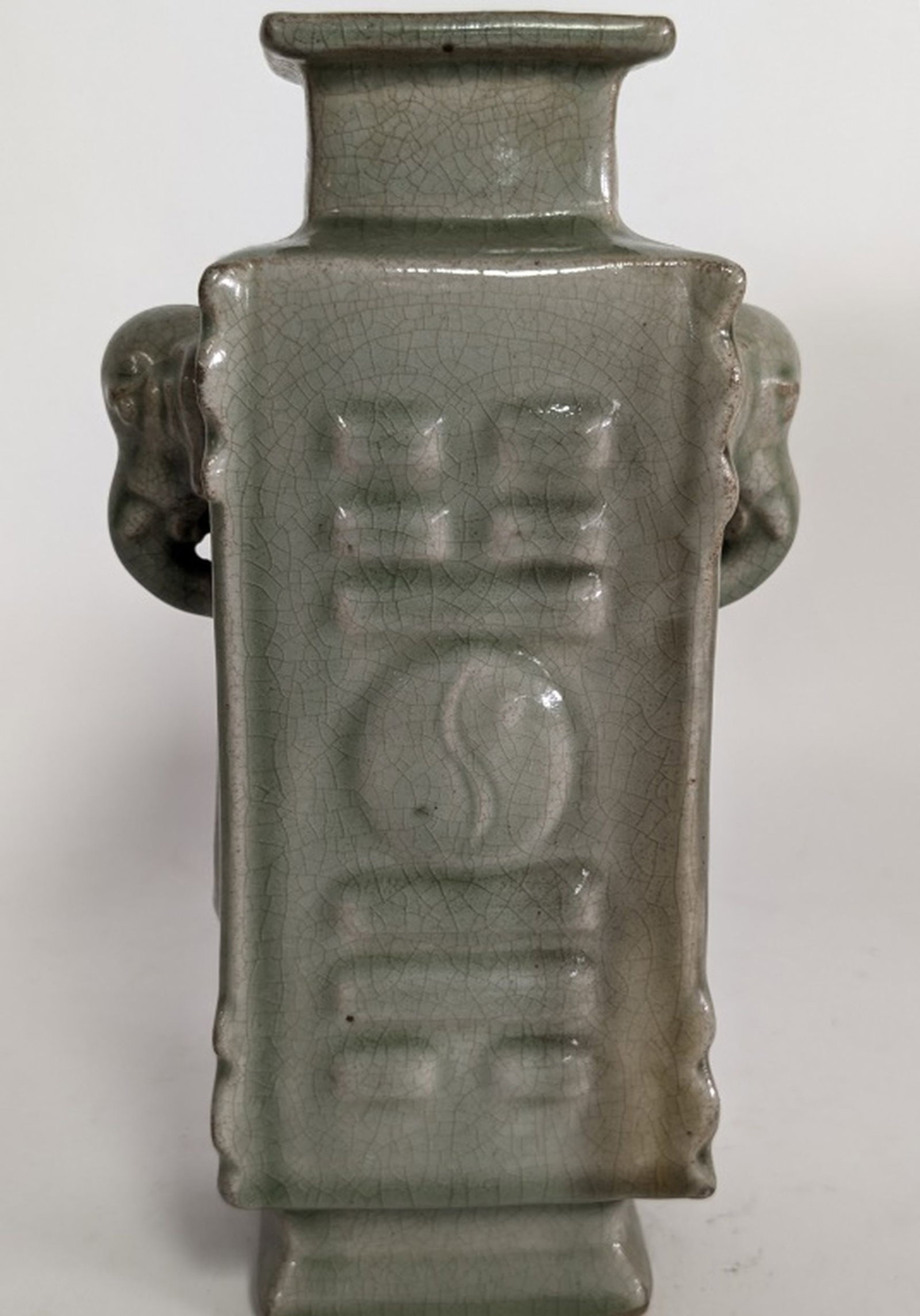 Antique Chinese Celadon Porcelain Cong Vase 9H": Superb Chinese celadon porcelain cong vase, likely from the late 19th or early 20th century. 9H x 5W x 3.5D in. It features a square body molded with the Eight Trigrams (Bagua), which are symbols used