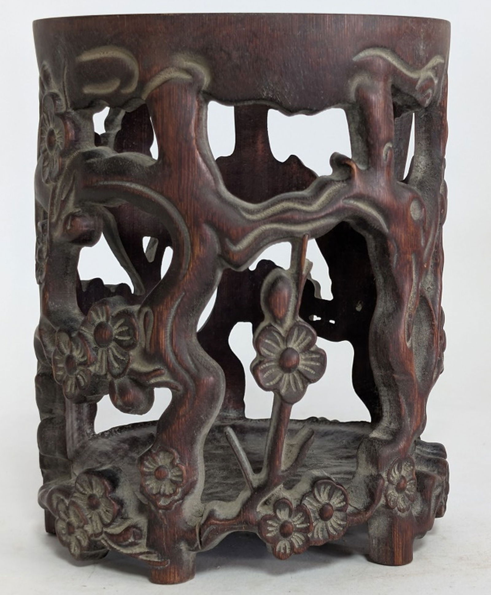 Antique Chinese Plum Blossom Brush Pot 6.5"H: Chinese natural bamboo hand-carved hollow out plum blossom brush pot from the earl to mid 20th century. 6.5H x 5W x 4.5D in. The item is made from natural bamboo. It features intricate, reticulated (h
