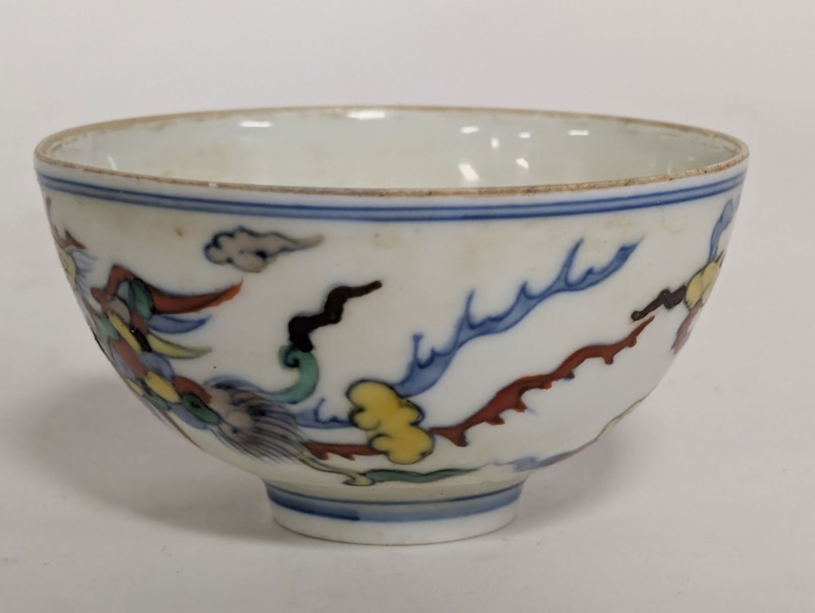 Antique Chinese Doucai Porcelain Cup 3.25D": Very fine Chinese porcelain cup decorated in the doucai technique, which translates to contending or "contrasting colours. Beautiful and petite! Cup: 1.75H x 3.25W in. Protective box: 4H x 4.25W x 4.2