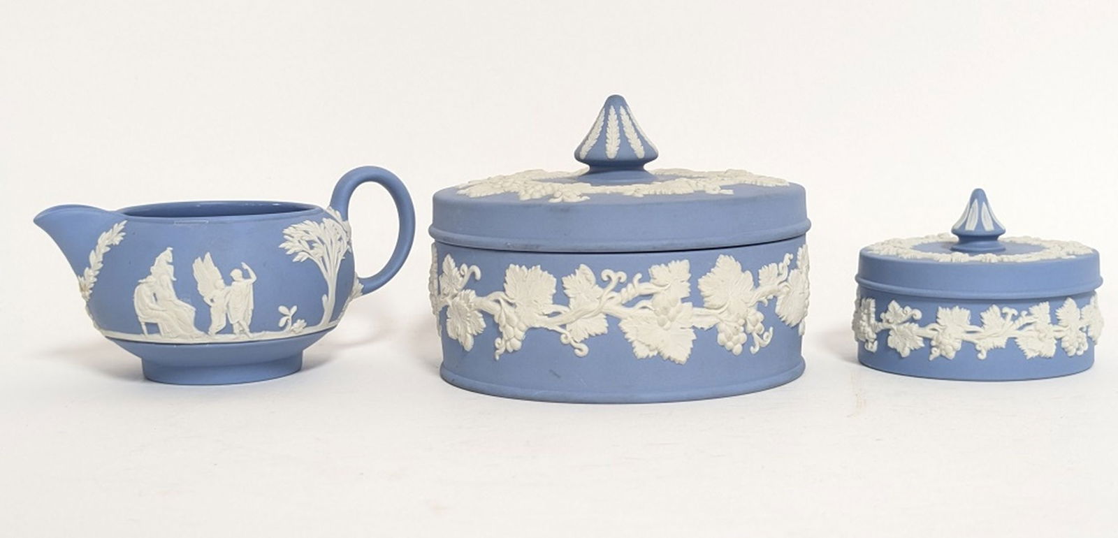 Wedwood Jasperware Covered Dishes & Creamer: 3 lovely Jasperware pieces for one price! 1- covered dish 2H x 3.25W in. 1- covered dish 3.5H x 5W in, 1- creamer 2.75W x 5W x 3.5D in. All in very good condition with no visible chips or cracks. Enjo