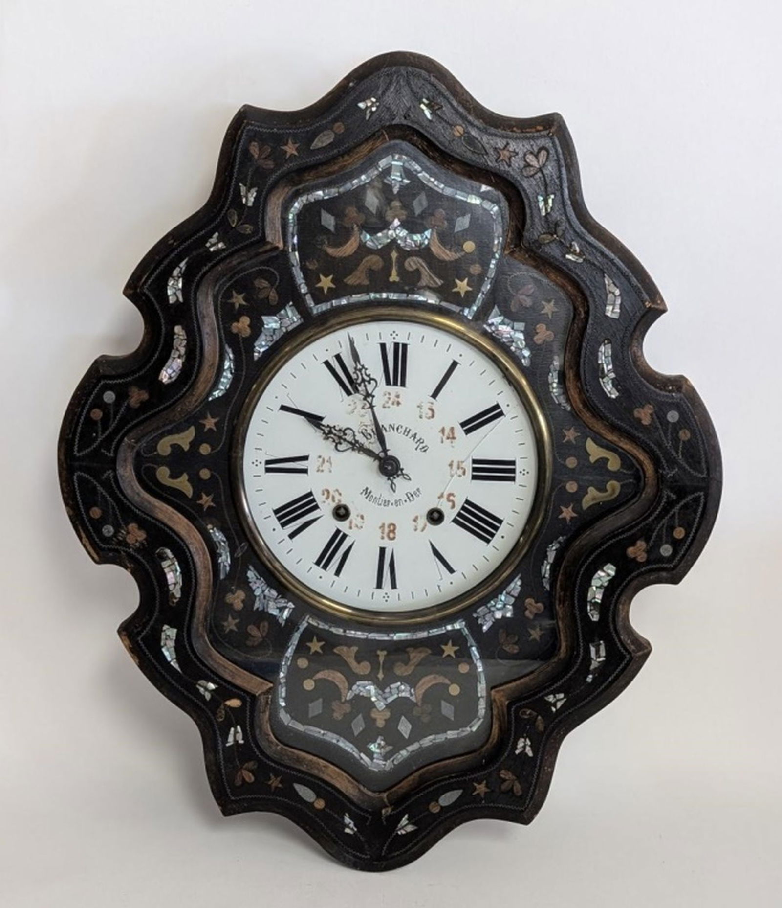 19thc French G Blanchard Montier en Der Wall Clock: Lovely 19thc Napoleon III antique clock, Wood frame, Mother of pearl inlay on front, Front lifts up to access clock face, Clock face has “G. Blanchard Montier en Der????. Good working cond
