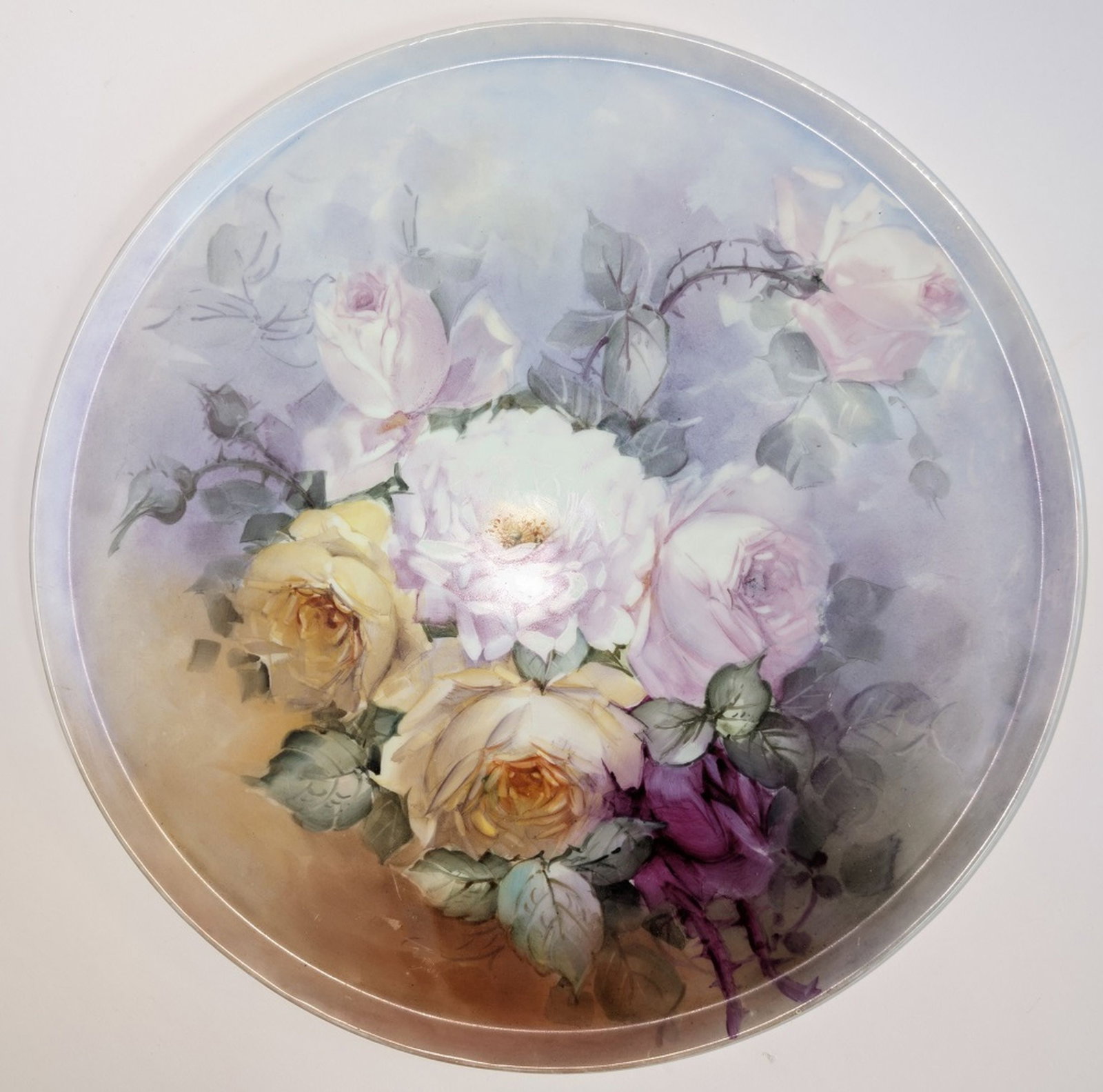 Fine Limoges Hand-Painted Porcelain Charger: Fine Limoges Hand-Painted Porcelain Charger. Late 19th/early 20th century. Diameter: 15.25 inches. A finely executed Limoges porcelain charger, hand-painted with a delicate bouquet of roses in soft pa