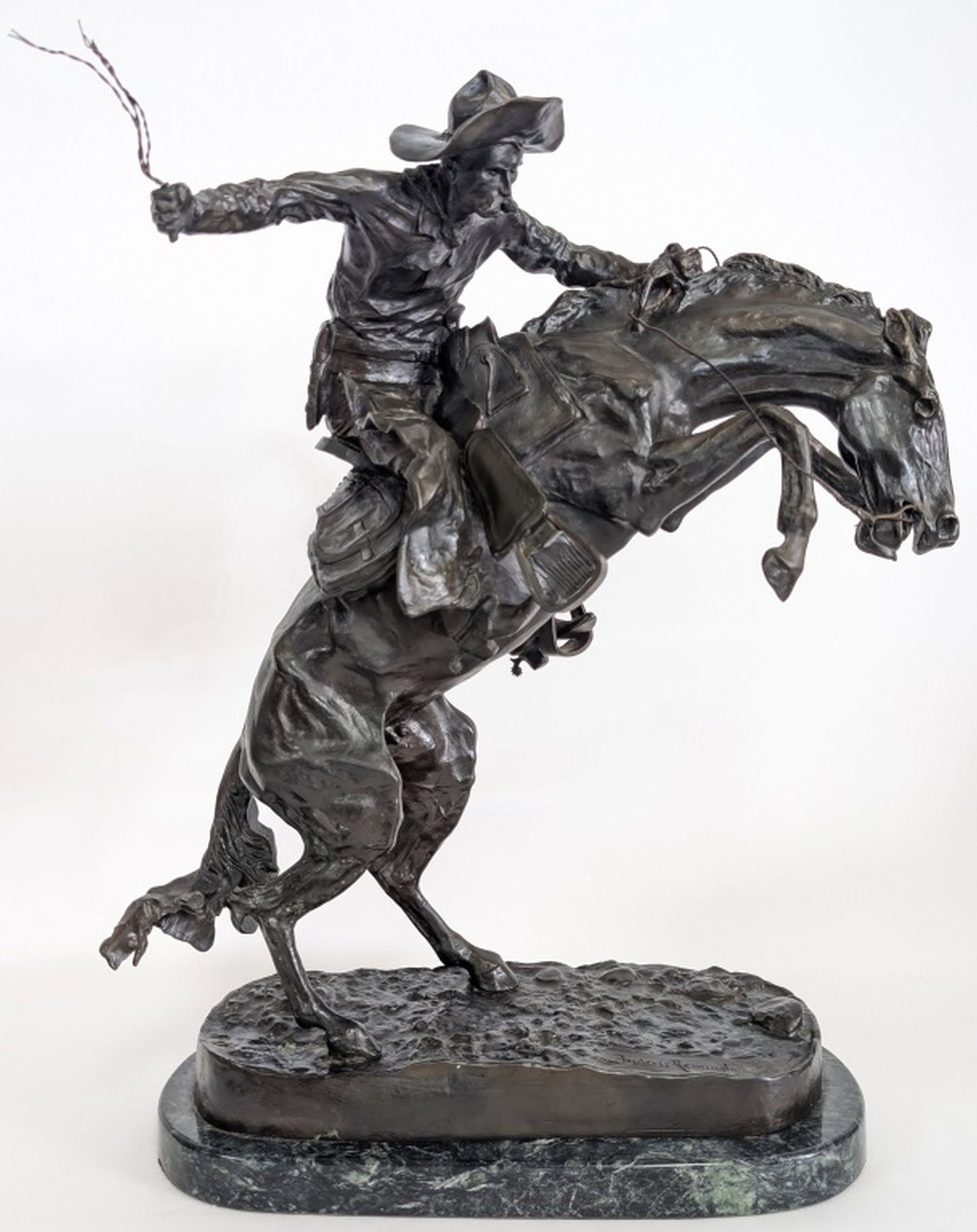 Remington "Bronco Buster" Bronze Ltd. Edition 23"H: After Frederic Remington (American, 1861–1909) The Broncho Buster (Bronco) Bronze sculpture on marble base. A compelling and enduring image of the American West, The Broncho Buster remains Frede
