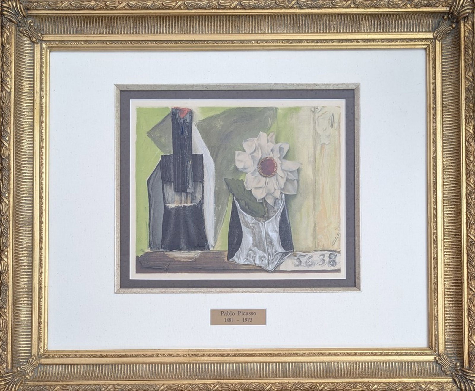 After Picasso Still Life Lithograph.: Attributed to Pablo Picasso Still Life with Bottle and Flower (after), 1957. Lithograph in colors on paper.Image: 8.5 x 11 in. (approximate sheet size consistent with book plate). Frame: 20 x 24 in. A