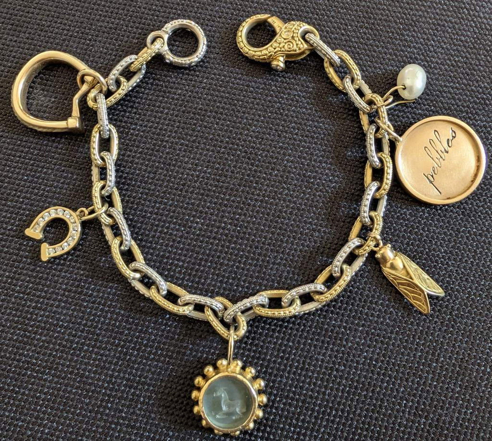 Alex Sepkus Platinum & 18K Gold Charm Bracelet: Alex Sepkus Platinum & 18K Gold Charm Bracelet with Intaglio, Diamond Horseshoe & Equestrian Charms. An exceptional Alex Sepkus handcrafted bracelet executed in 18K yellow gold and platinum, featuring