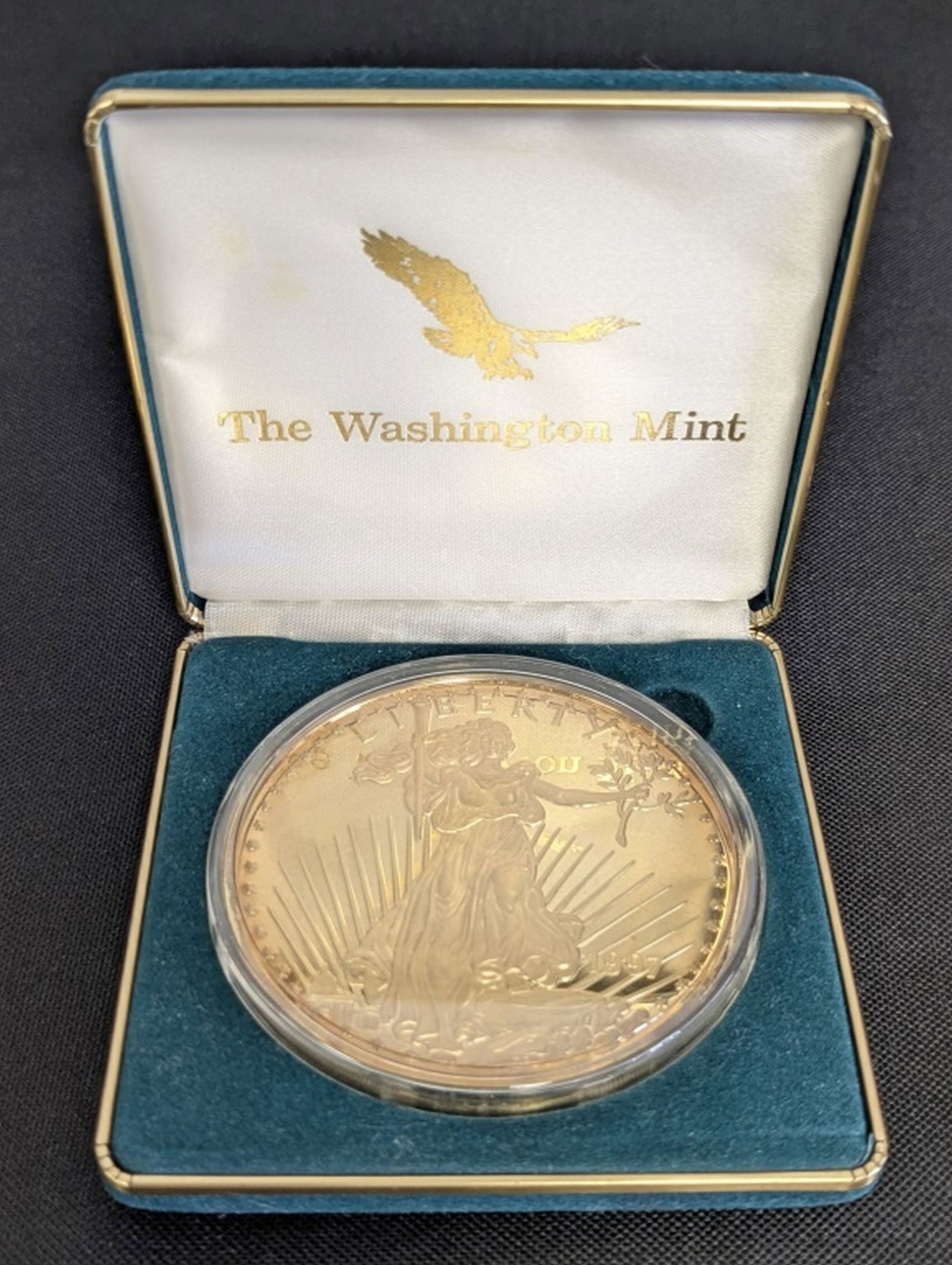 1997 1/2 Pound Fine Silver, 24K Gold Plated Coin: 1997 Washington Mint One-Half Pound Fine Silver 24K Gold-Plated Liberty Medallion. Washington Mint commemorative Liberty medallion, dated 1997, struck in one-half pound of fine silver and finished wit
