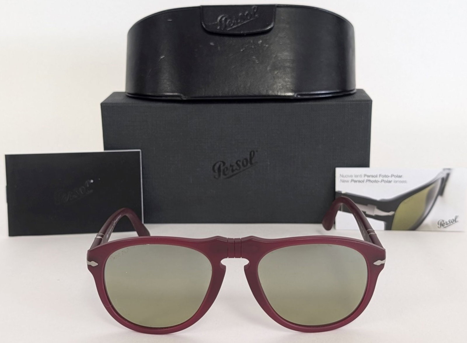 Persol PO649 Polarized Photochromic Sunglasses,: Persol PO649 Polarized Photochromic Sunglasses, Granato (Burgundy) – Complete with Case and Literature. Offered is a pair of authentic Persol PO649 sunglasses, handcrafted in Italy and presented