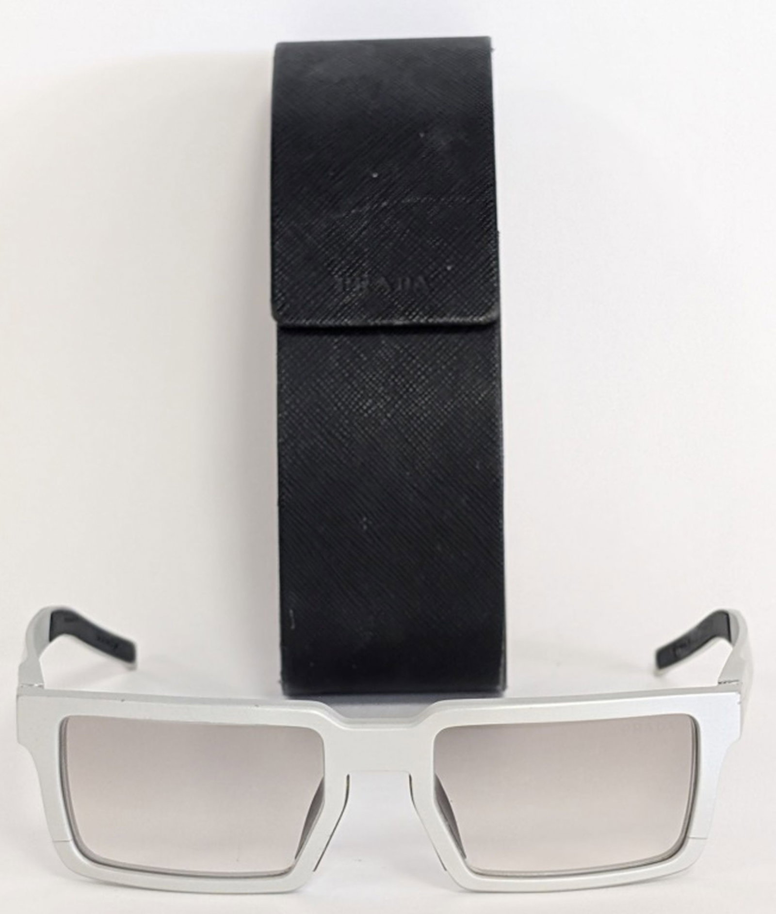 Prada SPR 50S Rectangular Shield Sunglasses: Prada SPR 50S Rectangular Shield Sunglasses. Offered is a pair of Prada model SPR 50S sunglasses, crafted in Italy and featuring a distinctive architectural rectangular shield-style frame in matte sil